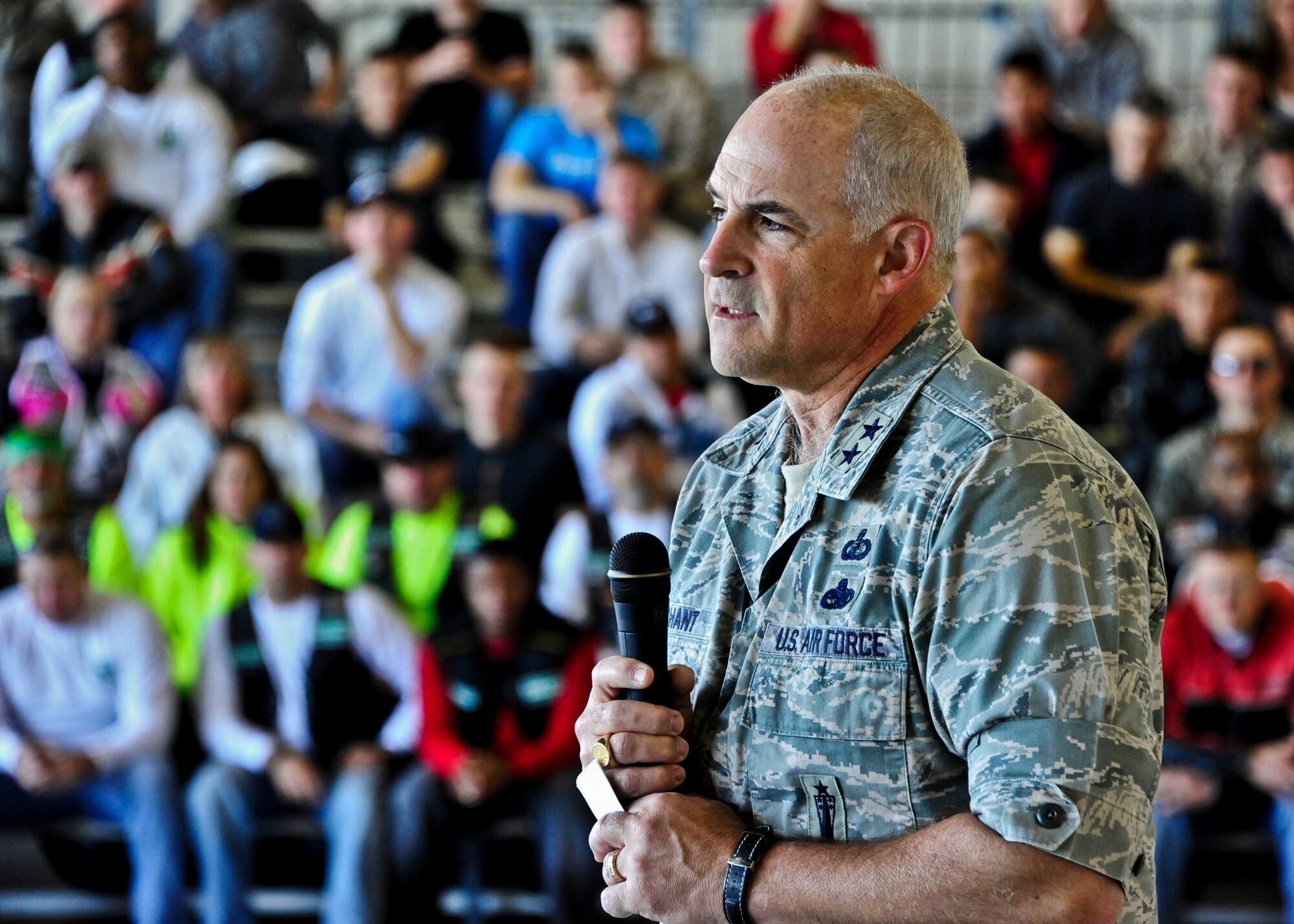 Maj. Gen. Kenneth Merchant, the Air Armament Center commander, speaks to a record crowd of 650 at Eglin’s annual motorcycle safety rally April 13.  The rally brought together bikers from all services and bases for safety discussions, riding courses and group rides.  (U.S. Air Force photo/Randy Gon)