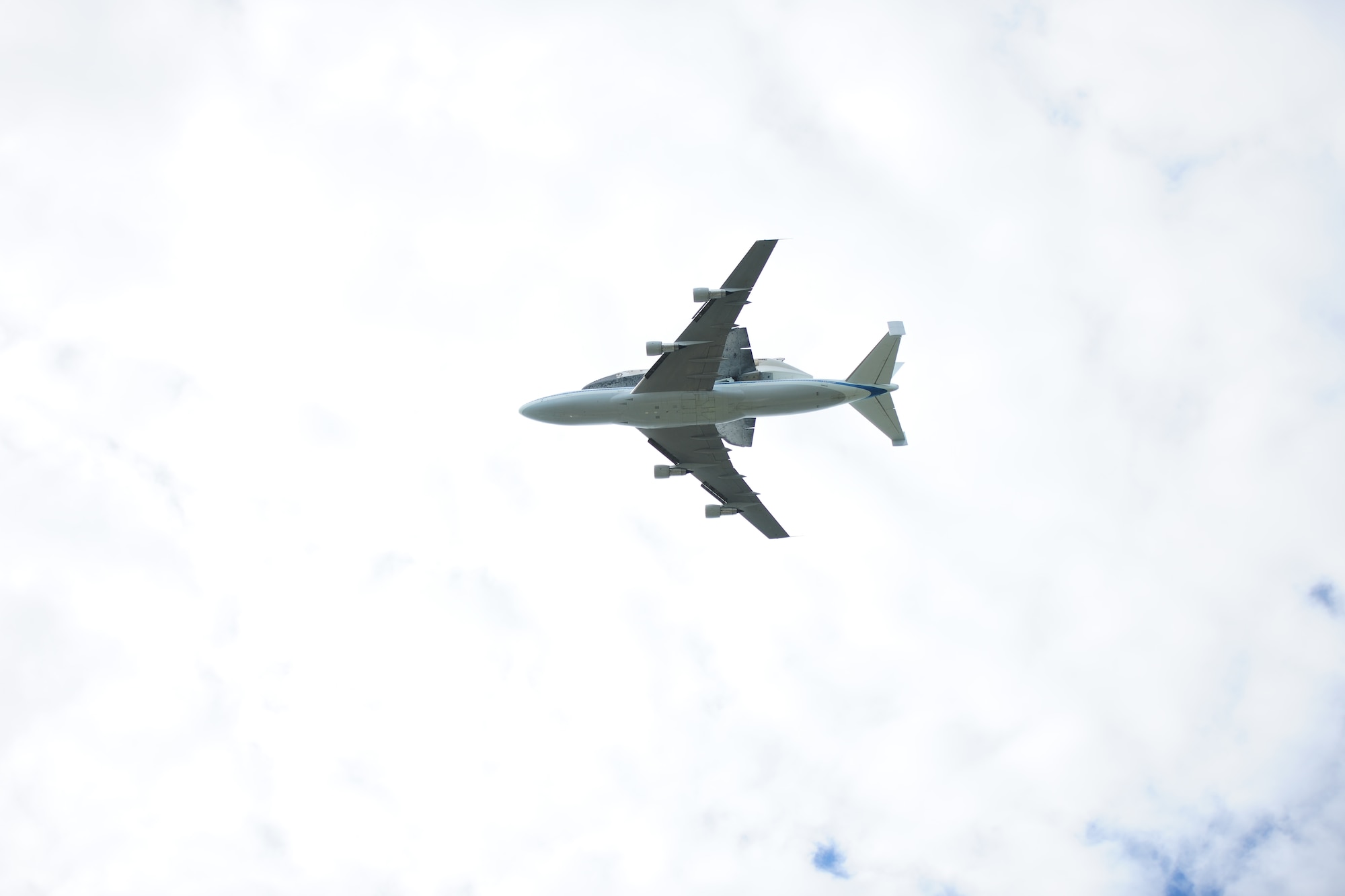 A NASA Shuttle Carrier aircraft carrying the space shuttle Discovery flies above the National Mall with a NASA chase plane escort April 17. The retired shuttle landed at the Washington Dulles International Airport for delivery to the National Air & Space Museum’s Udvar-Hazy Center. (U.S. Air Force photo/Senior Airman Amber Russell)
