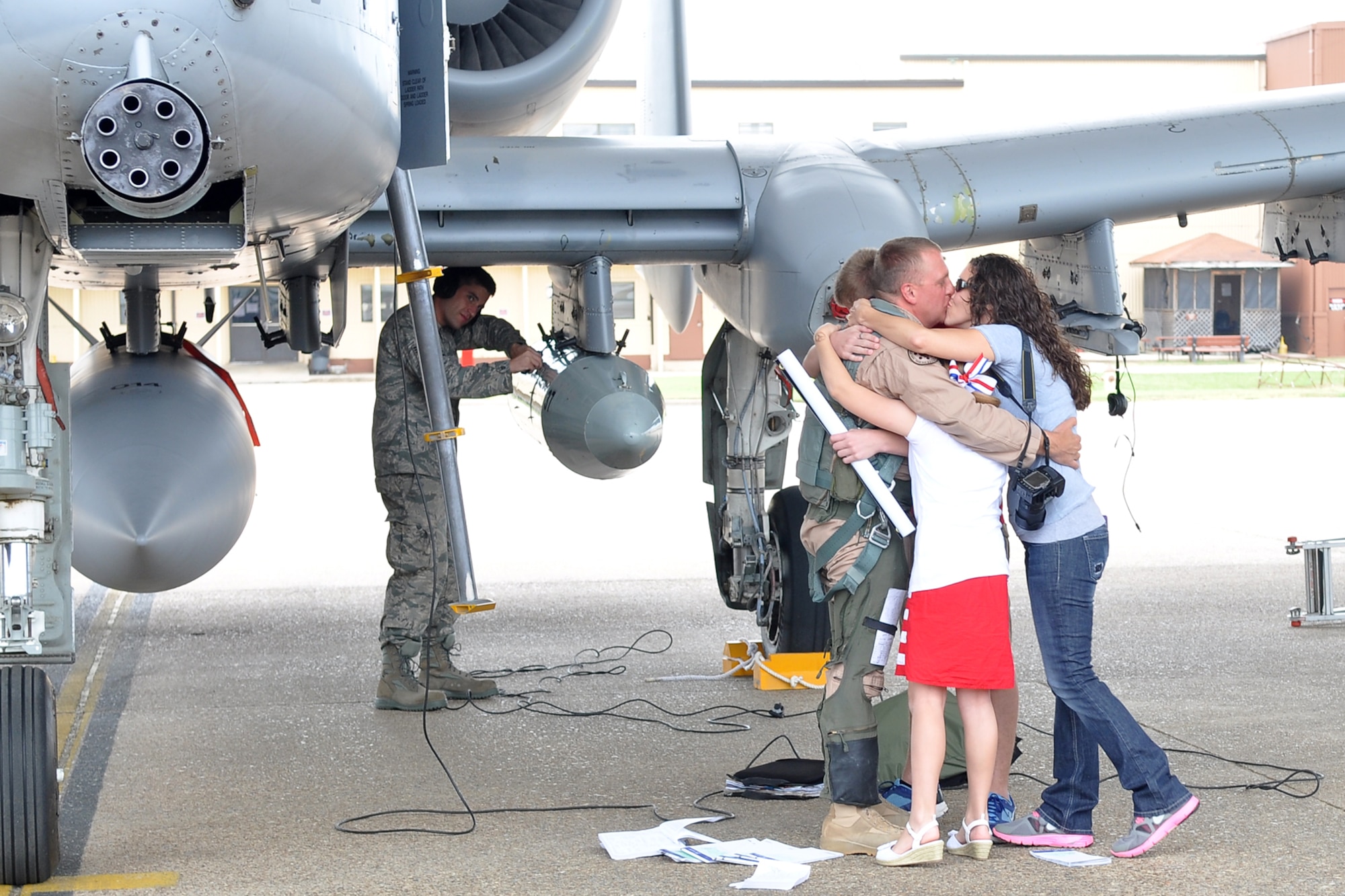Maj. Maurice Kent, an A-10 Thunderbolt II pilot assigned to the 47th Fighter Squadron, receives a warm welcome from his family at Barksdale Air Force Base, La., April 14, 2012. Kent arrived at Barksdale after a deployment to Afghanistan.  Approximately 150 Airman from the 917th Fighter Group who were deployed to Afghanistan have now returned to Barksdale. (U.S. Air Force photo by Betty Stephens) 
