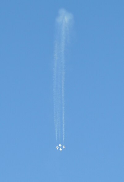 The U.S. Air Force Thunderbirds are spoted performing over nearby Davis-Monthan Air Force Base during the 162nd Fighter Wing’s 2012 basketball tournament April 15. (U.S. Air Force photo/Capt. Tricia Pacheco)