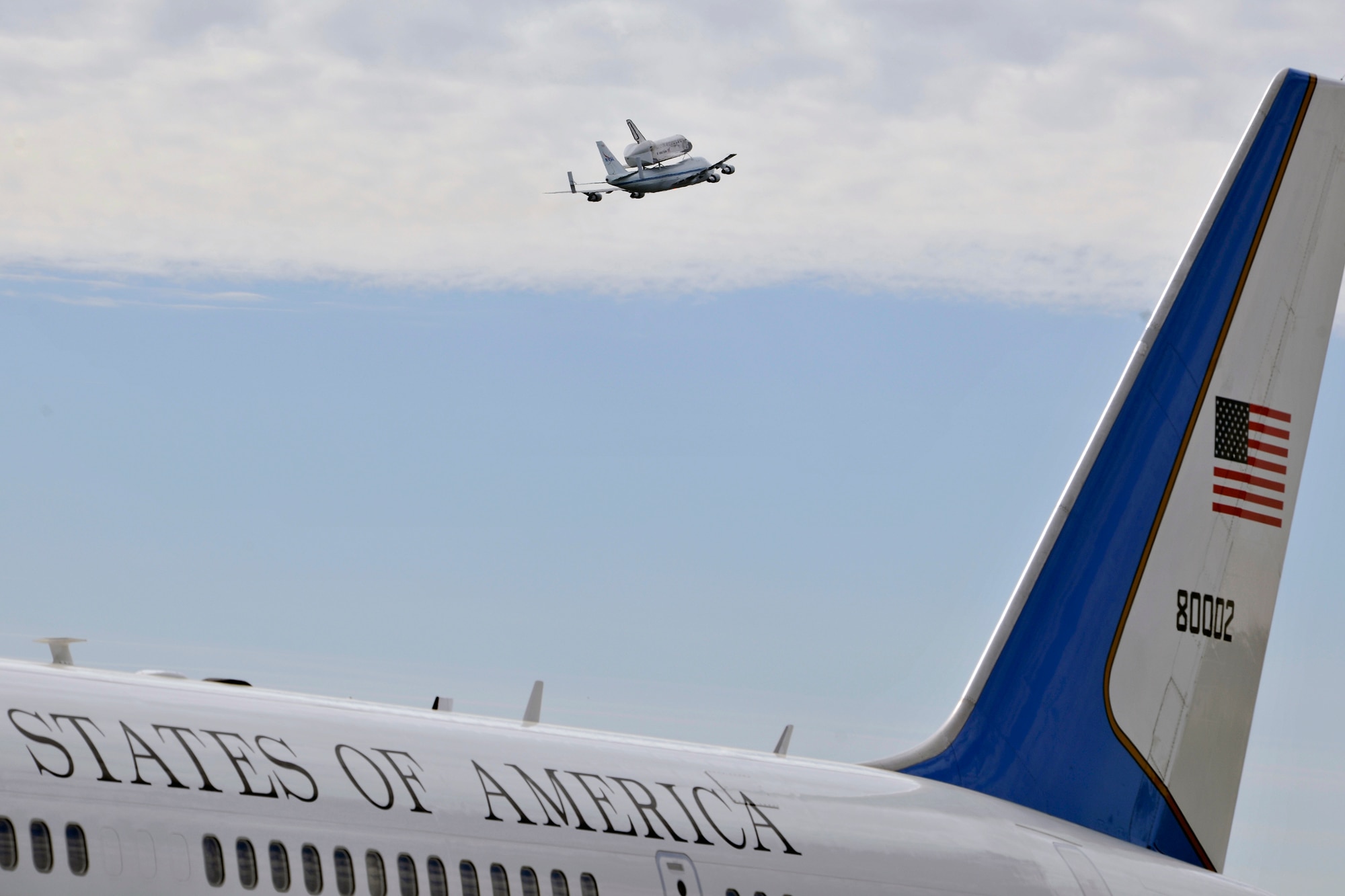 A shuttle carrier aircraft carrying the space shuttle Discovery flies above Joint Base Andrews, Md. on its final flight April 17. The retired shuttle landed at Washington Dulles International Airport for delivery to the National Air & Space Museum’s Udvar-Hazy Center.(U.S. Air Force Photo/ Senior Airman Perry Aston)