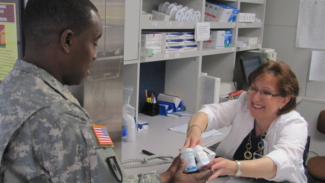 U.S. Army Sgt. 1st Class Taurus Buck, the McDonald Army Health Center Pharmacy Services NCOIC, turns in expired medication at the health center's pharmacy at Fort Eustis, Va., April 15, 2012. Individuals who wish to dispose of unwanted and unused prescription drugs may do so during the 2012 National Prescription Drug Take-Back Day event hosted April 28 at the Fort Eustis Exchange from 10 a.m. to 2 p.m. (U.S. Army photo by Marlon J. Martin/Released)