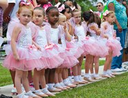 Dancers with Randolph Youth Programs wait their turn to take the stage during the annual Famaganza celebration April 14 at Joint Base San Antonio-Randolph, Texas. Famaganza is a yearly family celebration that includes performances, games, prizes and a book fair. (U.S. Air Force photo by Benjamin Faske)