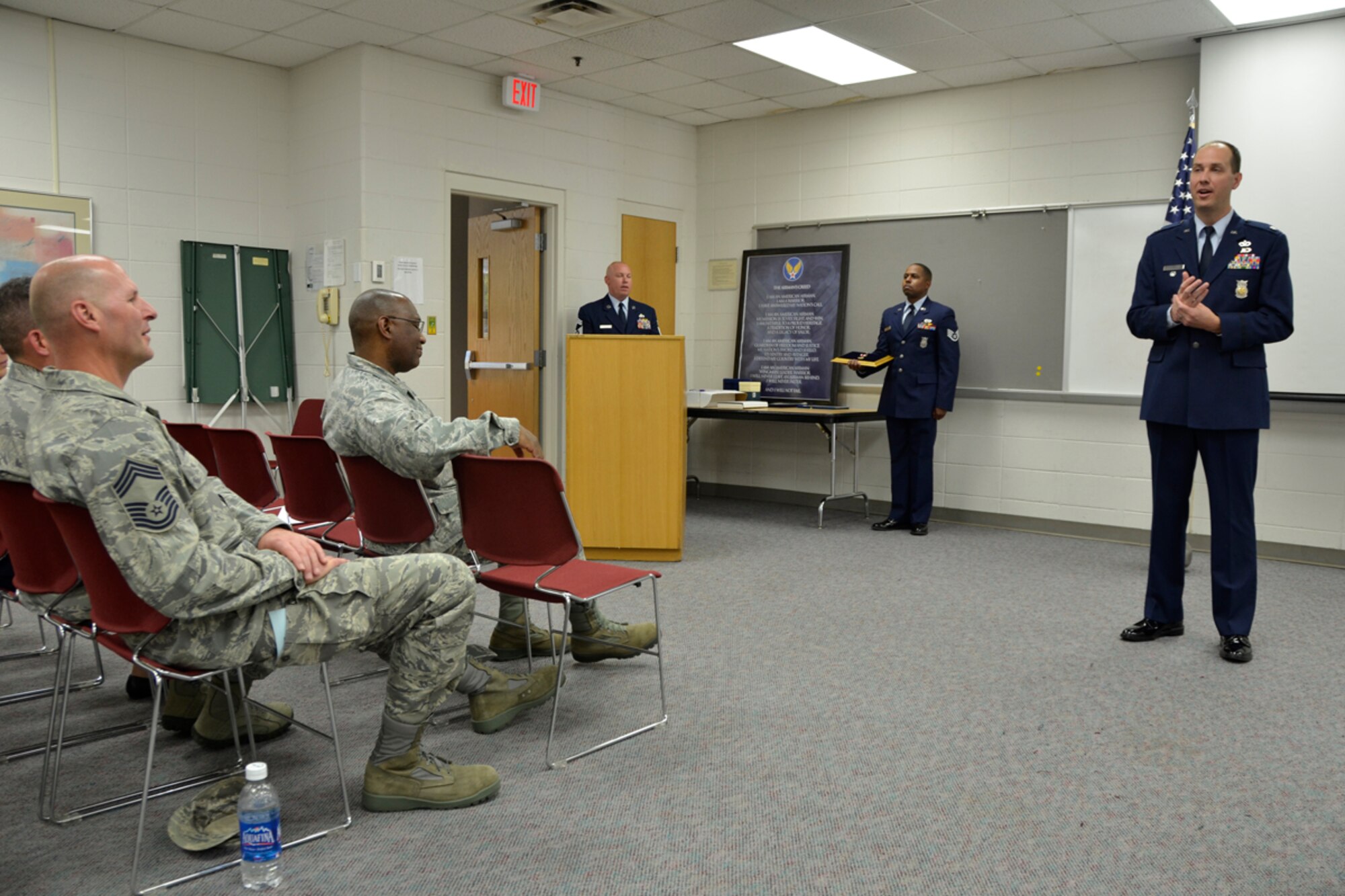 Lt. Col. Christopher Whitehead, 94th Mission Support Group deputy commander and former 94th CES commander, officiates a retirement ceremony for Master Sgt. Hilda Elaine Moses, 94th Civil Engineer Squadron health and safety officer. The ceremony was attended by a number of distinguished visitors, Airmen, family and friends. “When I hired Moses I thought to myself, what unit could better use an Airman trained in behavioral science than Civil Engineering?” Whitehead said jokingly as he highlighted Moses’ career. Moses celebrated 23 years of dedicated service to the U.S. Air Force. (U.S. Air Force photo/Master Sgt. James Branch)