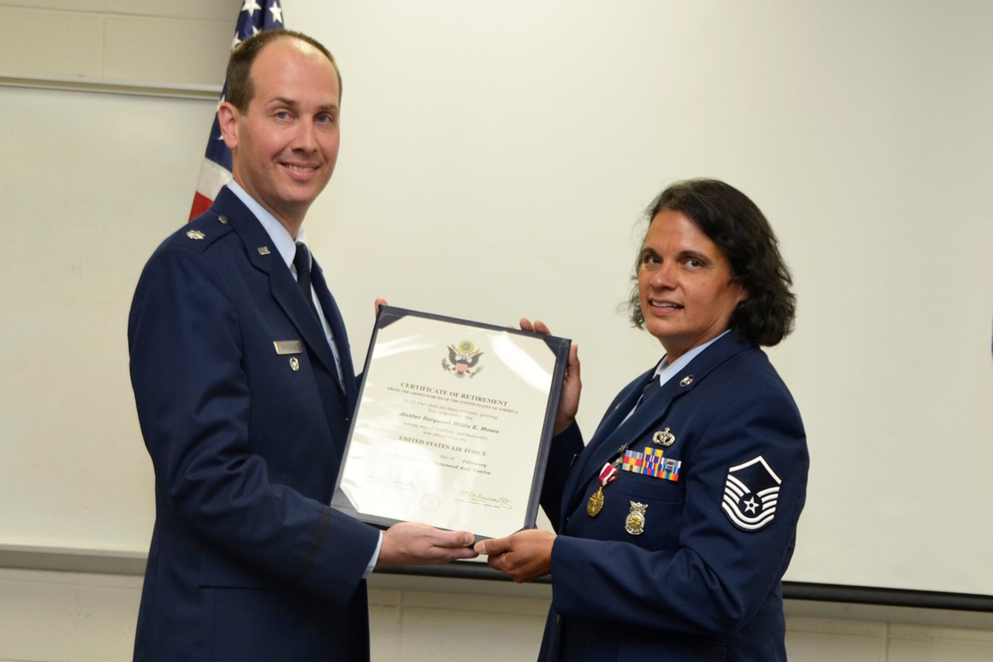 Master Sgt. Hilda Elaine Moses, 94th Civil Engineer Squadron health and safety officer, celebrated 23 years of dedicated service to the U.S. Air Force during a retirement ceremony April 14. “Moses exemplifies a can-do attitude,” said Lt. Col. Christopher Whitehead, 94th Mission Support Group deputy commander and former 94th CES commander. “Her courage and passion helps bring out the full potential of others.” (U.S. Air Force photo/Master Sgt. James Branch)