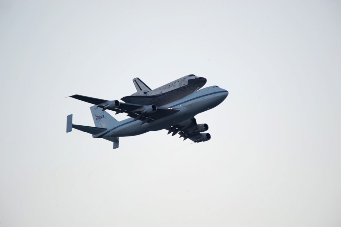 Space Shuttle Discovery took off from Kennedy Space Center on Florida's Space Coast for the last time April 17 parading down the beaches for public spectacle before making a u-turn at Patrick Air Force Base, Fla.to head north to its new home at the Smithsonian Institute in Washington D.C. Airmen from the 920th Rescue Wing, PAFB, were on hand for the past 50 years serving as guardians of the astronauts during all space shuttle launches and landings. (U.S. Air Force photo/Master Sgt. Rob Grande)
