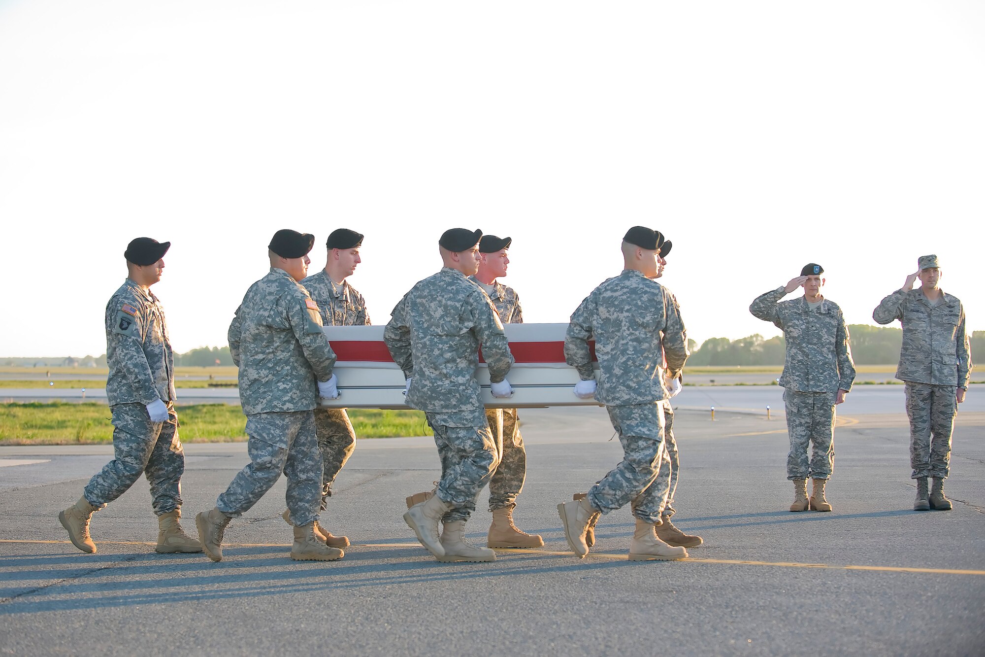 A U.S. Army carry team transfers the remains of Army Sgt. Tanner S. Higgins of Yantis, Texas, at Dover Air Force Base, Del., April 17, 2012. Higgins was assigned to the 1st Battalion, 75th Ranger Regiment, Hunter Army Field, Ga. (U.S. Air Force photo/Adrian R. Rowan)
