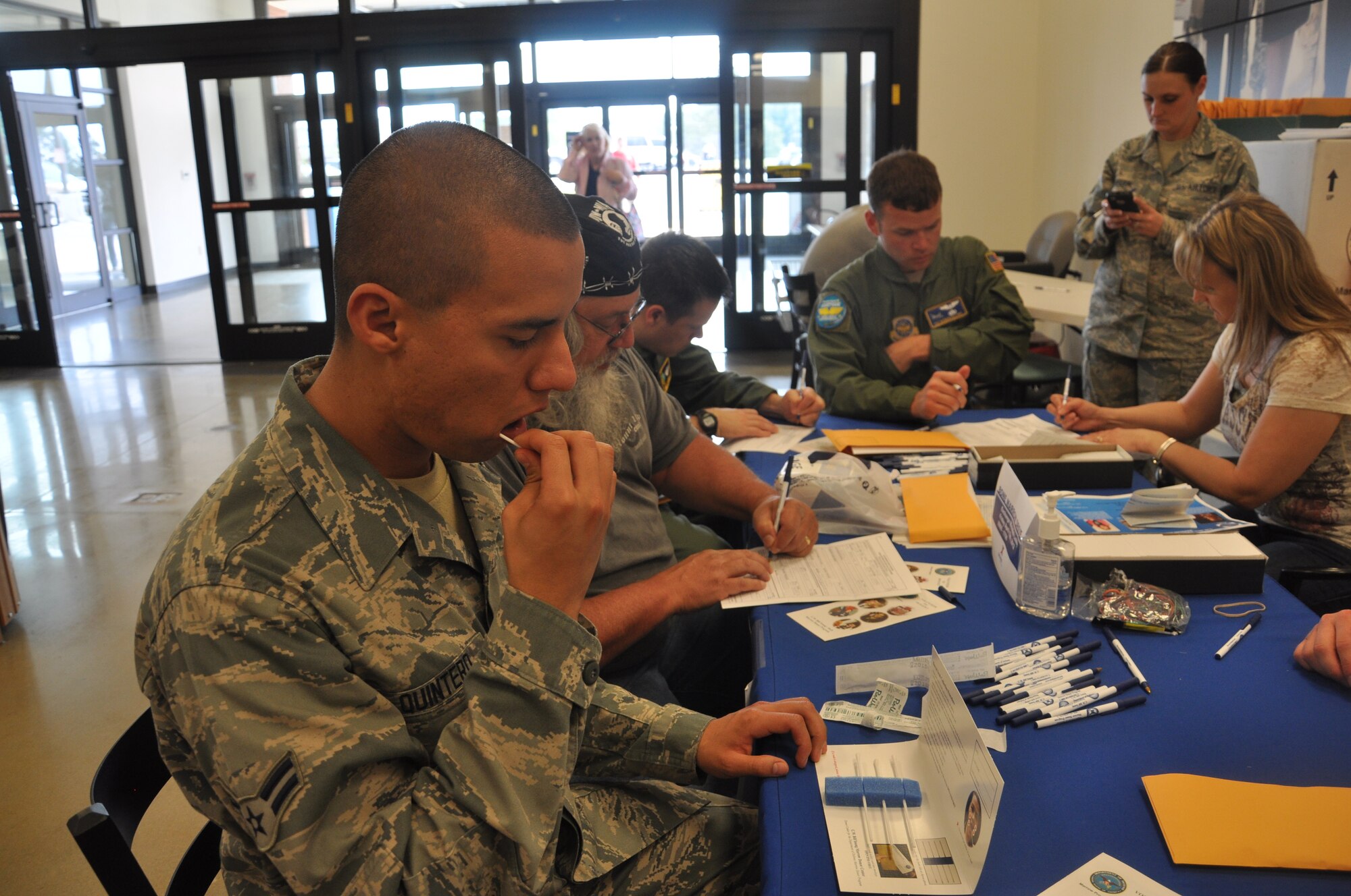 Airman 1st Class Luis Quintero, a 19th Aircraft Maintenance Squadron hydraulics apprentice, participates in the Bone Marrow Drive by swabbing his cheek April 13, 2012, at the Little Rock Air Force Base’s Base Exchange. The drive began April 9 and ended April 13. For dependents and those who didn’t get a chance to volunteer previously, the drive was held at the BX on April 13, from 9 a.m. to 5 p.m. (U.S. Air Force photo by Airman 1st Class Regina Agoha)