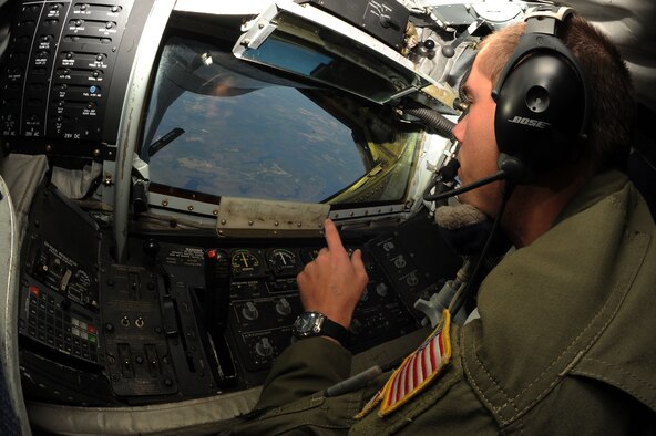 U.S. Air Force Senior Airman Andrew Steuart reviews the settings of a boom pod on a KC-135R Stratotanker while in flight over Seymour Johnson Air Force Base, N.C. April 12, 2012. As a boom operator, Steuart is responsible for refueling aircraft while airborne. Stuart, 77th Air Refueling Squadron boom operator, is a native of Raleigh, N.C. (U.S. Air Force photo/Airman 1st Class John Nieves Camacho/Released)