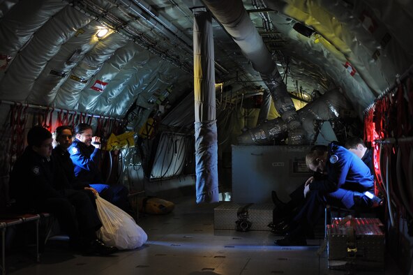 Air Force Junior Reserve Officer Training Corps cadets react to the starting of engines of a KC-135R Stratotanker on Seymour Johnson Air Force Base, N.C., April 12, 2012. For recruiting purposes selected cadets from all over N.C. receive an hour and a half incentive flight courtesy of the 916th Air Refueling Wing. (U.S. Air Force photo/Airman 1st Class John Nieves Camacho/Released)