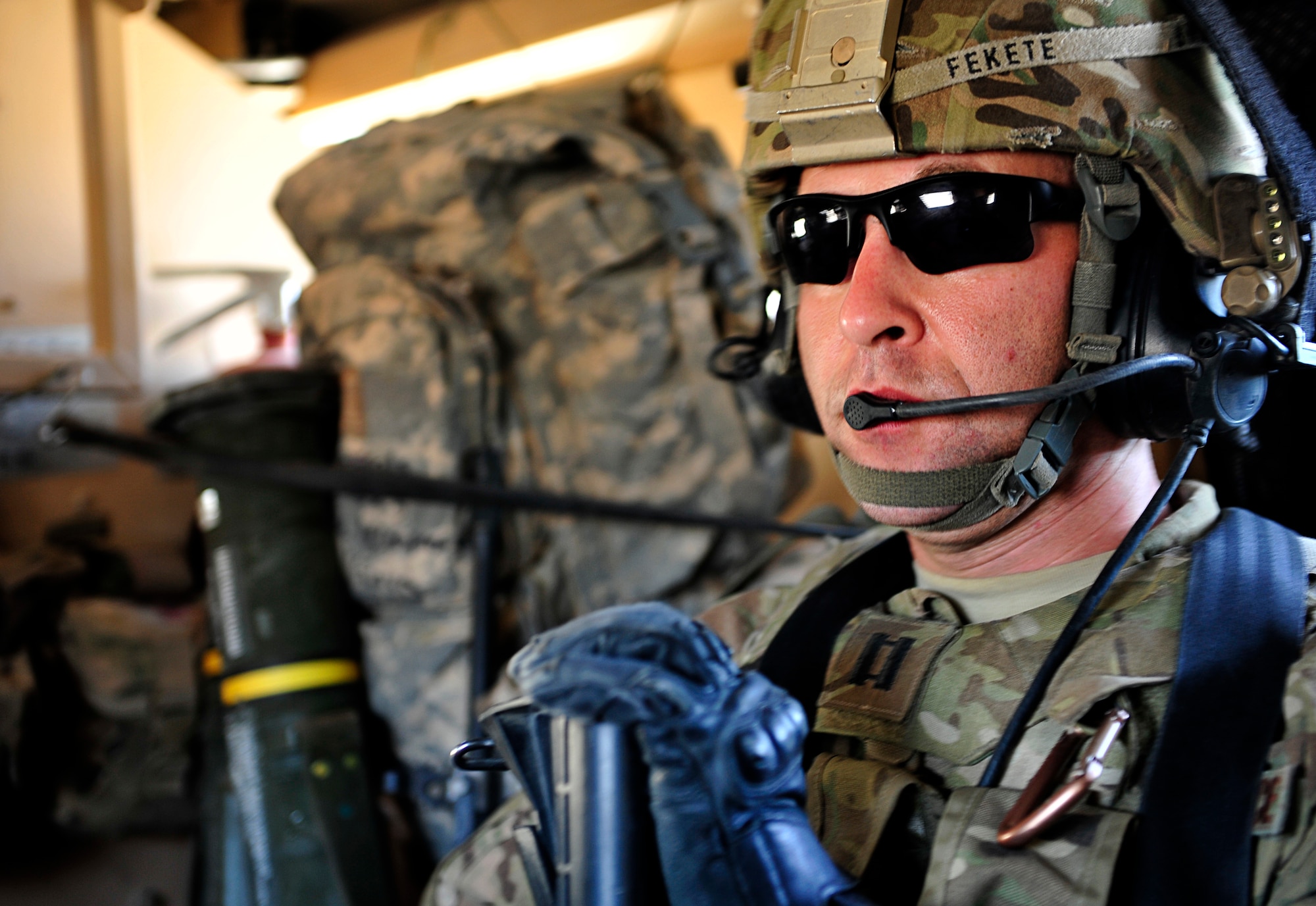 U.S. Air Force Capt. Robert Fekete, senior logistics advisor with an Afghanistan National Civil Order Police Combat Advisor Team, travels to a patrol base during a routine mission to advise and assist members of the ANCOP 2nd Kandak, 3rd Brigade, in Kajaki, Afghanistan, April 5, 2012. The ANCOP Combat Advisor Team is comprised of four Air Force officers that act as lead advisers and a group of highly trained Soldiers that are responsible for the team's security. It is the team's mission to help train and advise the ANCOP 2/3 Kandak on how to secure and protect their country from insurgents. (U.S. Air Force photo by Staff Sgt. Sara Csurilla)