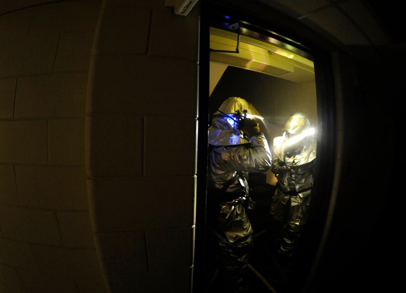 Firefighters from the 8th Civil Engineer Squadron report critical information back to their counterparts as part of a simulated structural fire exercise on Kunsan Air Base, Republic of Korea, April 17, 2012. The exercise was part of the fire department’s Consolidated Unit Inspection by the Pacific Air Forces Inspector General team. (U.S Air Force photo/Senior Airman Jessica Hines)