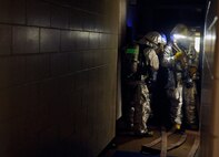 Firefighters from the 8th Civil Engineer Squadron respond to a simulated structural fire in an old dormitory on Kunsan Air Base, Republic of Korea, April 17, 2012. The exercise was part of the fire department’s Consolidated Unit Inspection by the Pacific Air Forces Inspector General team. (U.S Air Force photo/Senior Airman Jessica Hines)