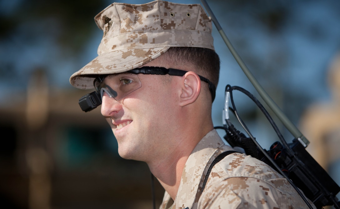 Cpl. Benjamin Gottwald an instructor from Lake Ann, Mich., with II Marine Expeditionary Force Headquarters Group, demonstrates how to use an explosive ordnance disposal robot during counter improvised explosive device awareness training, April 17, at Camp Lejeune, N.C. The training provided participants with a look at what tools and techniques are available to counter the threat of roadside bombs during deployment.