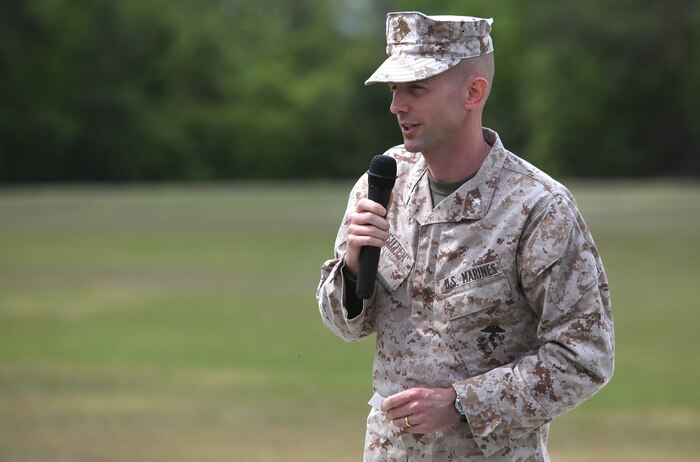 Lt. Col. Matthew B. Reuter addresses a crowd of family, friends and colleagues after relinquishing command of Combat Logistics Battalion 22 during a ceremony at Soifert Field aboard Camp Lejeune, N.C., April 18, 2012. During his tenure with CLB-22, a subordinate command of 2nd Marine Logistics Group, which serves as the logistical asset for the 22nd Marine Expeditionary Unit, the battalion deployed for 10 months in support of Operation Unified Protector.