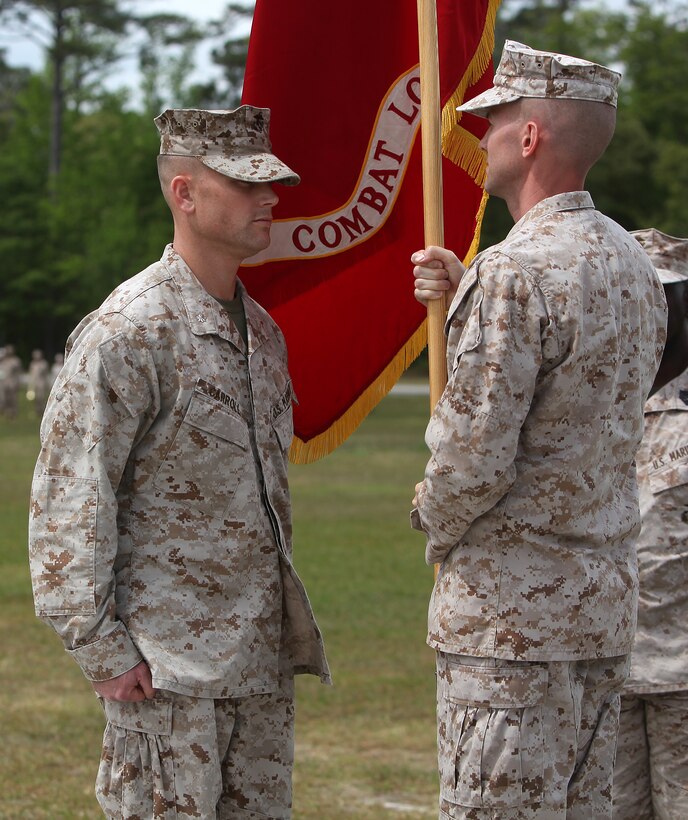 LtCol Reuter, about to pass the battalion guideon to LtCol Carroll at the Combat Logistics Battalion 22 Change of Command Ceremony.