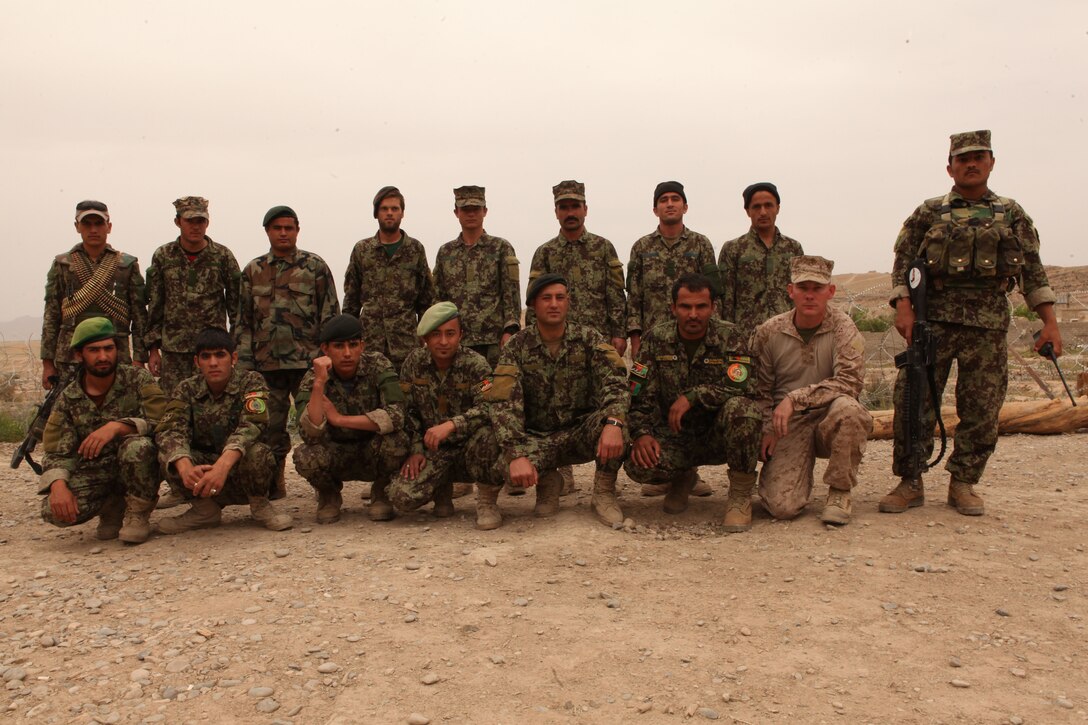 26th Marine Expeditionary Unit Marines (MEU) pose for photograph at the Raintree House, a home for teenage victims of abusive or neglectful families in the Garden District of New Orleans, April 18, 2012. The 26th MEU is currently providing support to the commemoration of the Battle of New Orleans. Starting through April and continuing through 2015, the Navy, Marine Corps, and Coast Guard will commemorate the Bicentennial of the War of 1812 and the Star Spangled Banner. The War of 1812 celebration with commemorate the rich Naval history and showcase the capabilities of today's Navy-Marine Corps team. (Official Marine Corps photo by Lance Cpl. Scott L. Tomazycki)