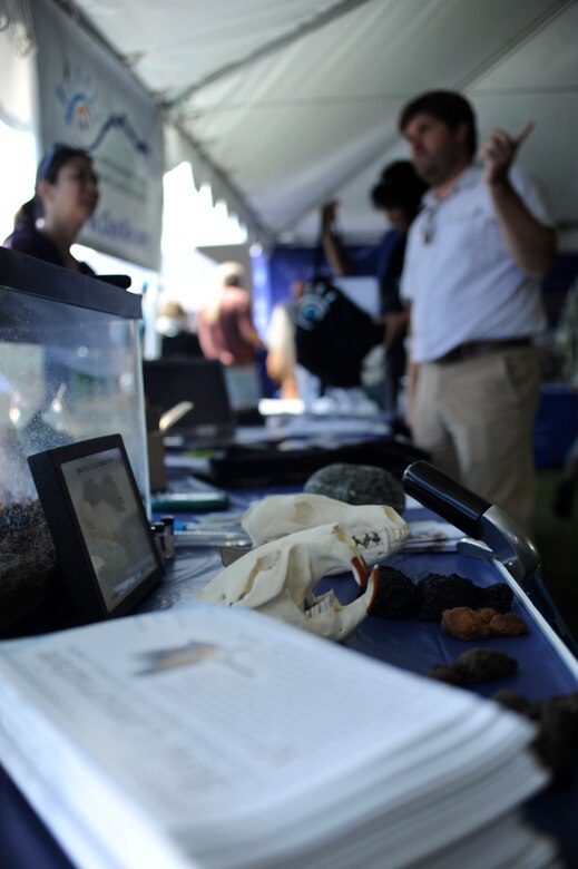 VANDENBERG AIR FORCE BASE, Calif. --Team V members view displays during an Earth Day event here Wednesday, April 18, 2012. More than 25 base and local organizations participated in this environmental awareness campaign. (U.S. Air Force photo/Staff Sgt. Andrew Satran)  