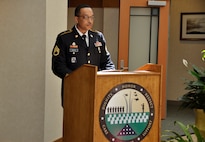 Army Staff Sgt. Joseph Green narrates during a promotion ceremony at the Charles C. Carson Center for Mortuary Affairs April 5, 2012. Green is assigned to the Army Liaison Team as a member of the Casualty and Mortuary Affairs Operations Center, U.S. Army Human Resources Command, located at Fort Knox, Ky. (U.S. Air Force photo/Staff Sgt. James W. Jackson)
