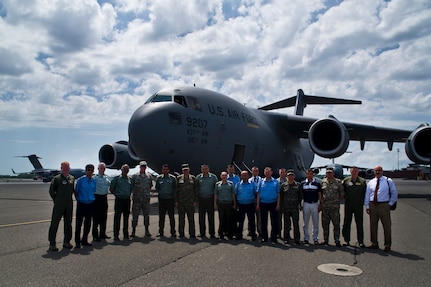 Delegates from the Tajikistan, Turkmenistan and Uzbekistan militaries pose for a picture after touring a C-17 Globemaster III at Joint Base Charleston - Air Base April 17. (U.S. Air Force photo by Airman 1st Class George Goslin)