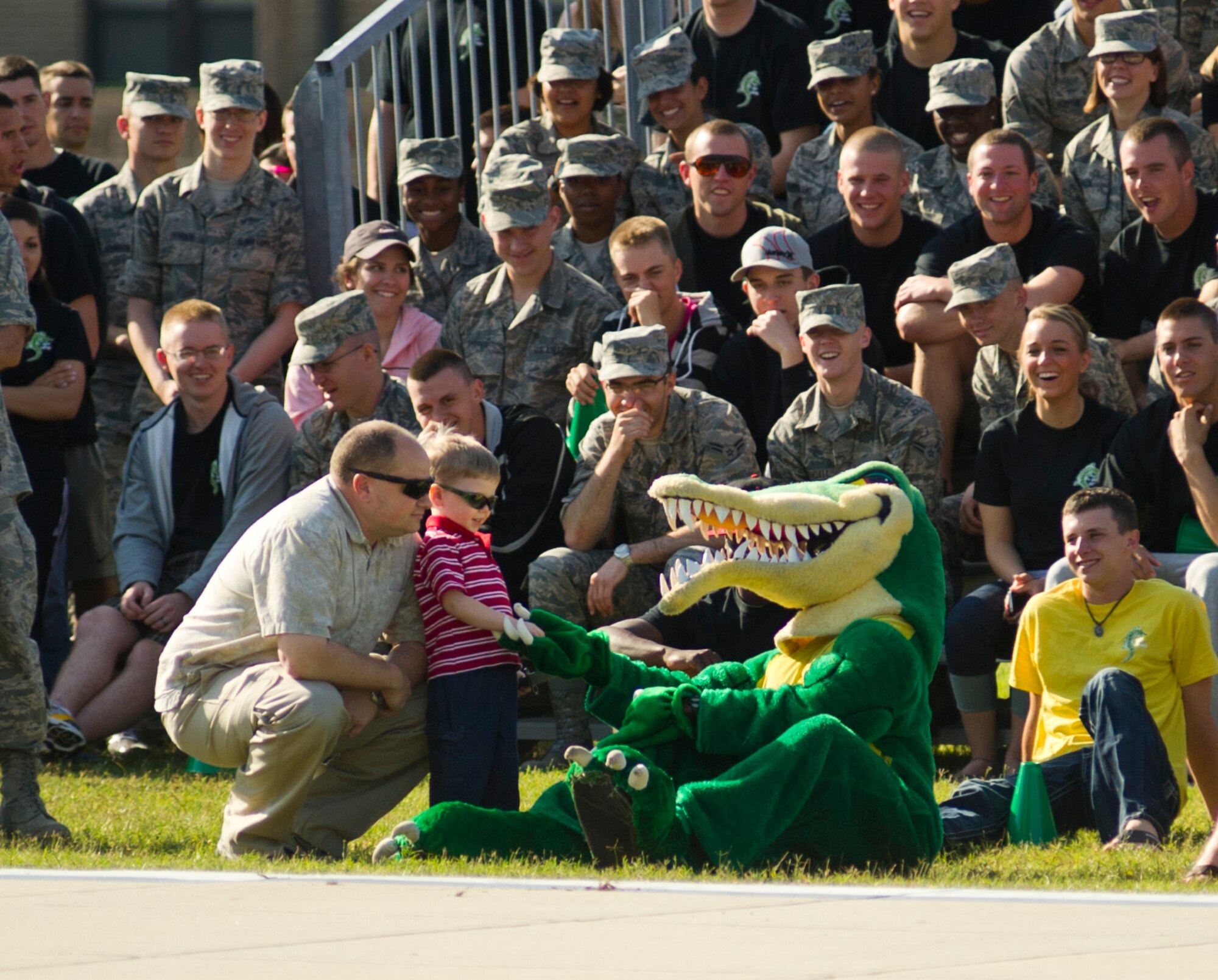 The 336th Training Squadron mascot gets stealthy during the drill down competition April 13, 2012, at Keesler Air Force Base, Miss. The Red Wolves won the competition which included an open ranks inspection, regulation drill and freestyle drill categories.  (U.S. Air Force photo by Adam Bond)