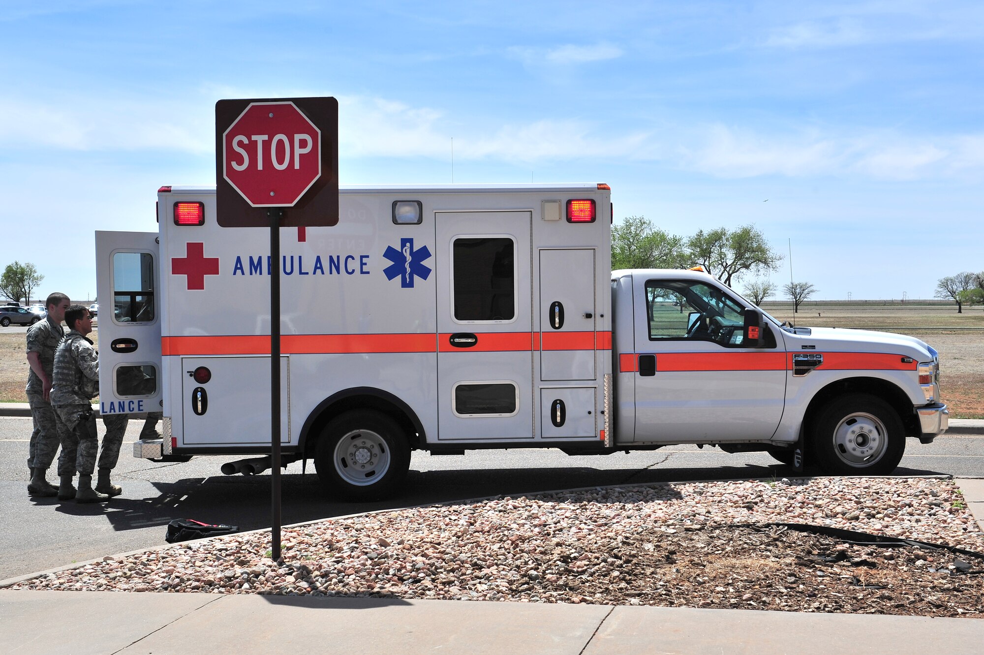 An ambulance arrives at the scene of a simulated tornado during a natural disaster exercise at Cannon Air Force Base, N.M., April 5, 2012. Training exercises provide a safe and controlled environment to practice tactics, techniques and procedures. (U.S. Air Force photo by Tech. Sgt. Josef Cole)