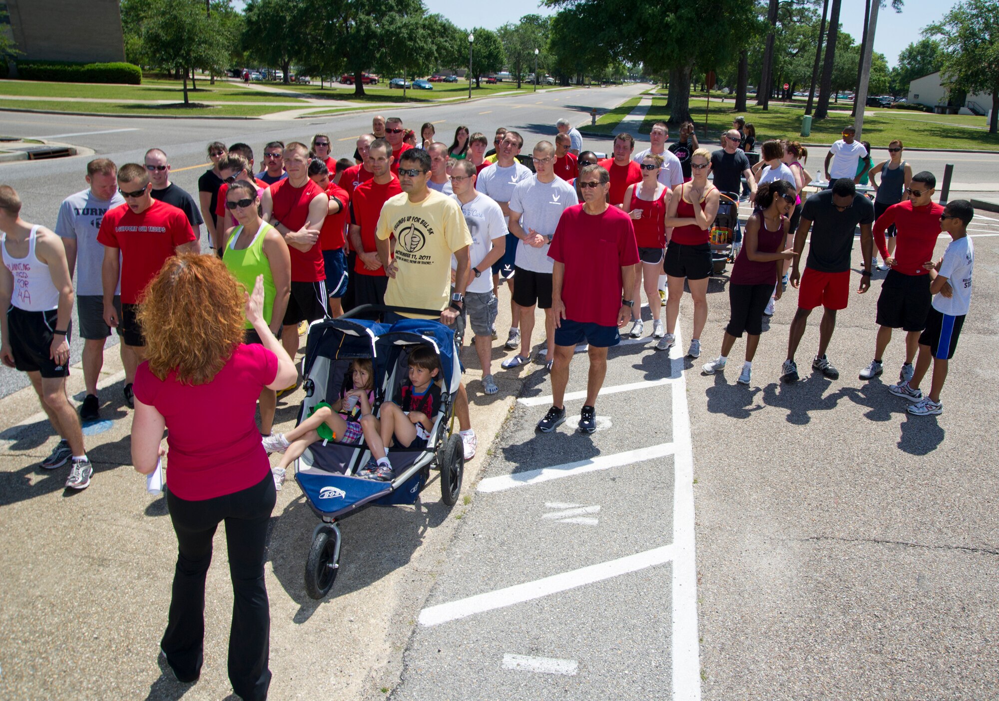 Runners in the National Alcohol 5k run April 13, 2012, at Keesler Air Force Base, Miss., receive final updates about the course prior to start.  (U.S. Air Force photo by Adam Bond)