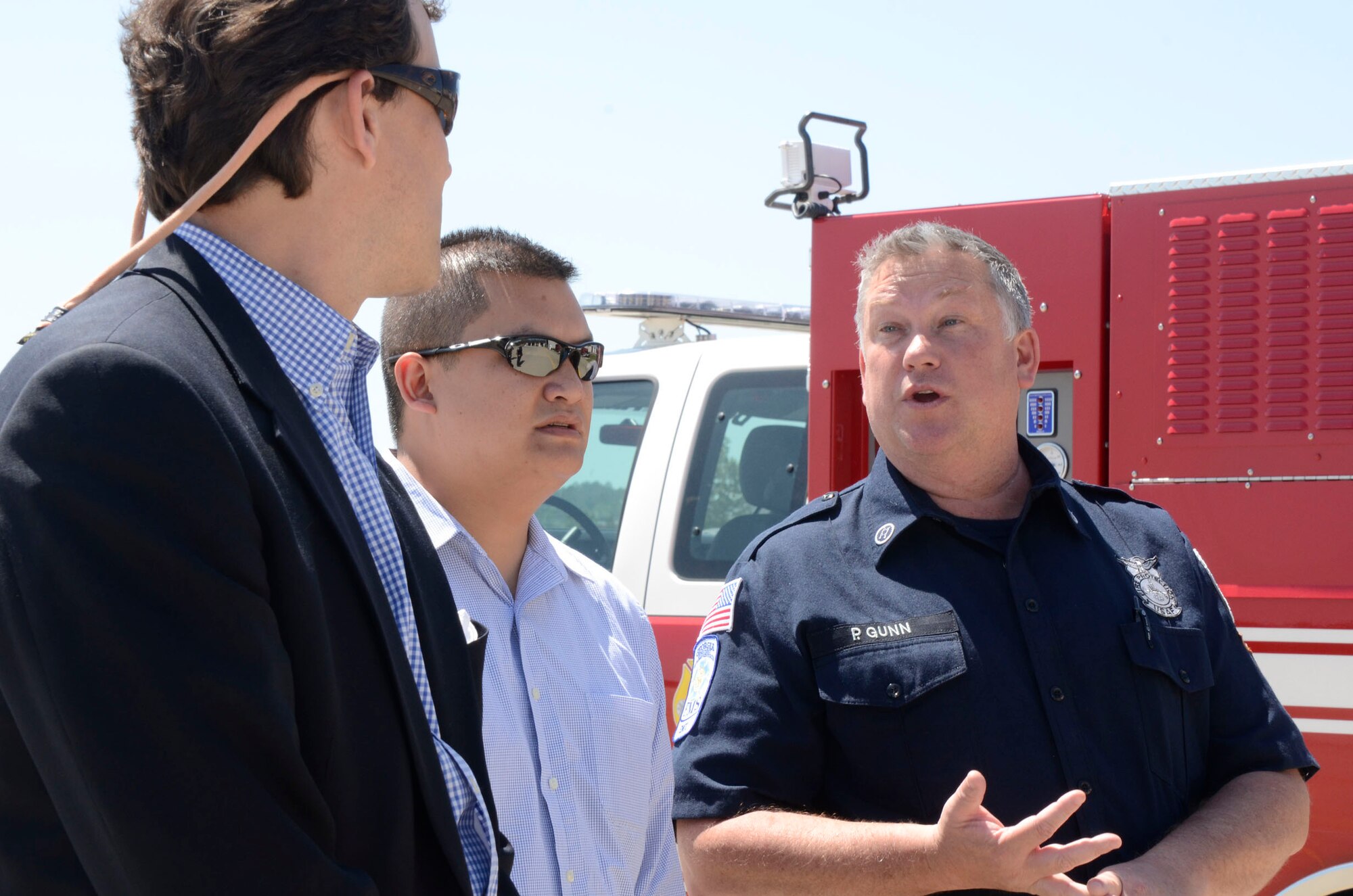 Patrick J. Gunn, firefighter from the Dobbins Fire Department express improvement concerns to Tommy Nguyen, staff member for Georgia Senator Johnny Isakson during his visit here April 9. (U.S. Air Force photo/Don Peek)