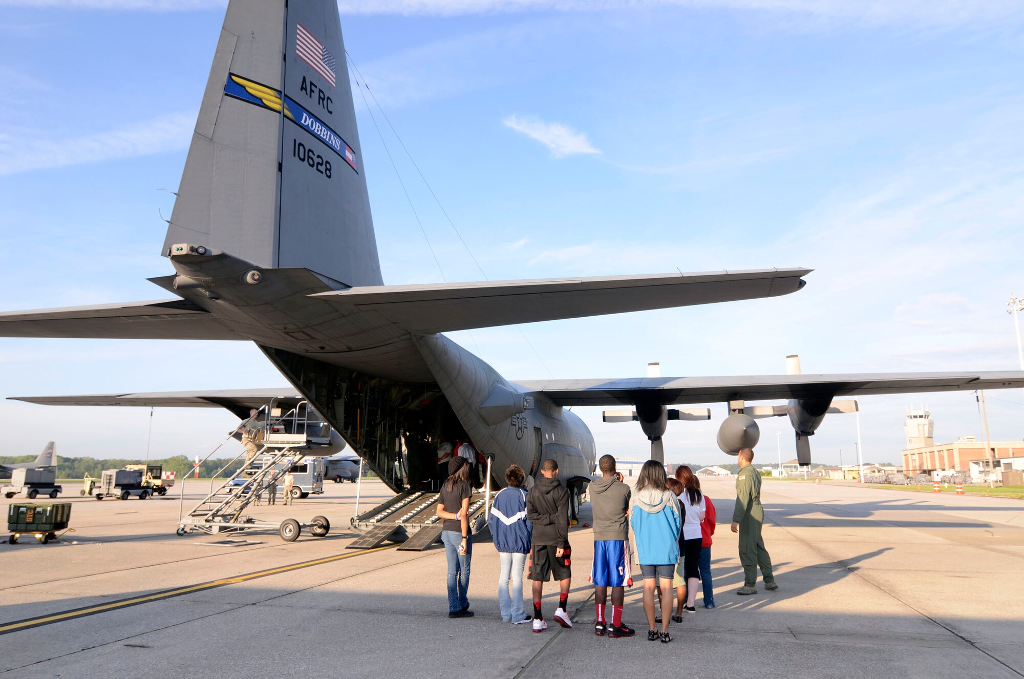 Students from Whites Creek High School Air Force JROTC, Nashville, Tenn. are greeted by aircrews during a tour of a C-130 here April 4. The cadets observed maintenance functions and were briefed on operations during flying missions. (U.S. Air Force photo/Don Peek)
