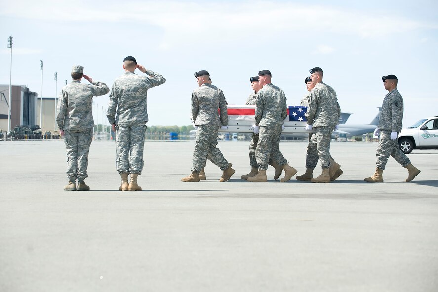 A U.S. Army carry team transfers the remains of Army Staff Sgt. David P. Nowaczyk of Dyer, Ind., at Dover Air Force Base, Del., April 17, 2012. Nowaczyk was assigned to the 2nd Battalion, 12th Infantry Regiment, 4th Brigade Combat Team, 4th Infantry Division, Fort Carson, Colo. (U.S. Air Force photo/Adrian R. Rowan)
