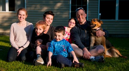 The Sole family has one daughter and two sons. All three are enrolled in the base exceptional family member program. Eight-year-old Xander (back row third from left) has Attention Deficit Hyperactive Disorder as well as multiple learning disabilities. Carl has Autism Spectrum Disorder in addition to epilepsy, cerebral palsy and intellectual disabilities as a result of periventricular leukomalacia. The Sole’s youngest child Phillip (center) has speech and fine motor delays. (U.S. Air Force photo by Airman 1st Class Dennis Sloan)