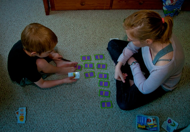Kayleigh Norton, Applied Behavior Analysis therapist, reviews animals and colors with six-year-old Carl, son of Sarah and Tech. Sgt. Carl Sole, 628th Security Forces Squadron flight chief, April 13. Carl was diagnosed with Autism Spectrum Disorder in addition to epilepsy, cerebral palsy and intellectual disabilities as a result of periventricular leukomalacia. Norton comes to the Sole’s home six days a week and uses specific techniques and interventions to help Carl with his autism. (U.S. Air Force photo by Airman 1st Class Dennis Sloan)