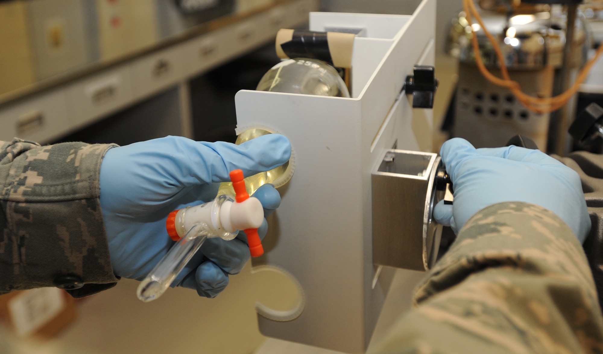 U.S. Air Force Airman 1st Class Jesse King, 35th Fuels Management fuels laboratory technician, performs the fuels system icing inhibitor test at Misawa Air Base, Japan, April 17, 2012. The FSII in fuel acts as anti-freeze for the water in fuel so it does not freeze while aircraft are at high altitudes. (U.S. Air Force photo by Airman Kenna Jackson)
