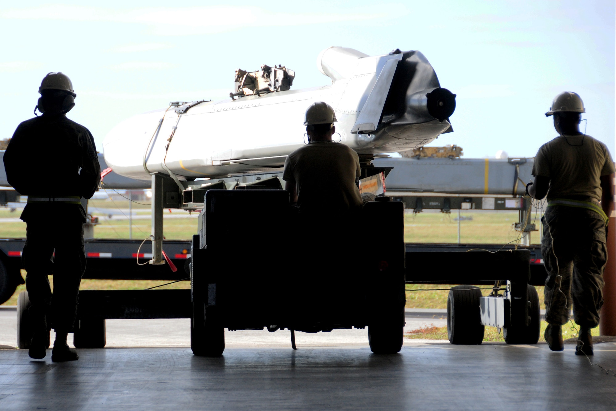 ANDERSEN AIR FORCE BASE, Guam- Missile maintainers from the 36th Munitions Squadron transport a Conventional Air- Launched Cruise Missile during the Pre Combat Ammunition Production Exercise April 9. During the CAPEX approximately 100 inspectors will evaluate the processes and procedures for building munitions to support the wing’s operational plan.  (U.S. Air Force photo by Senior Airman Jeffrey Schultze)  