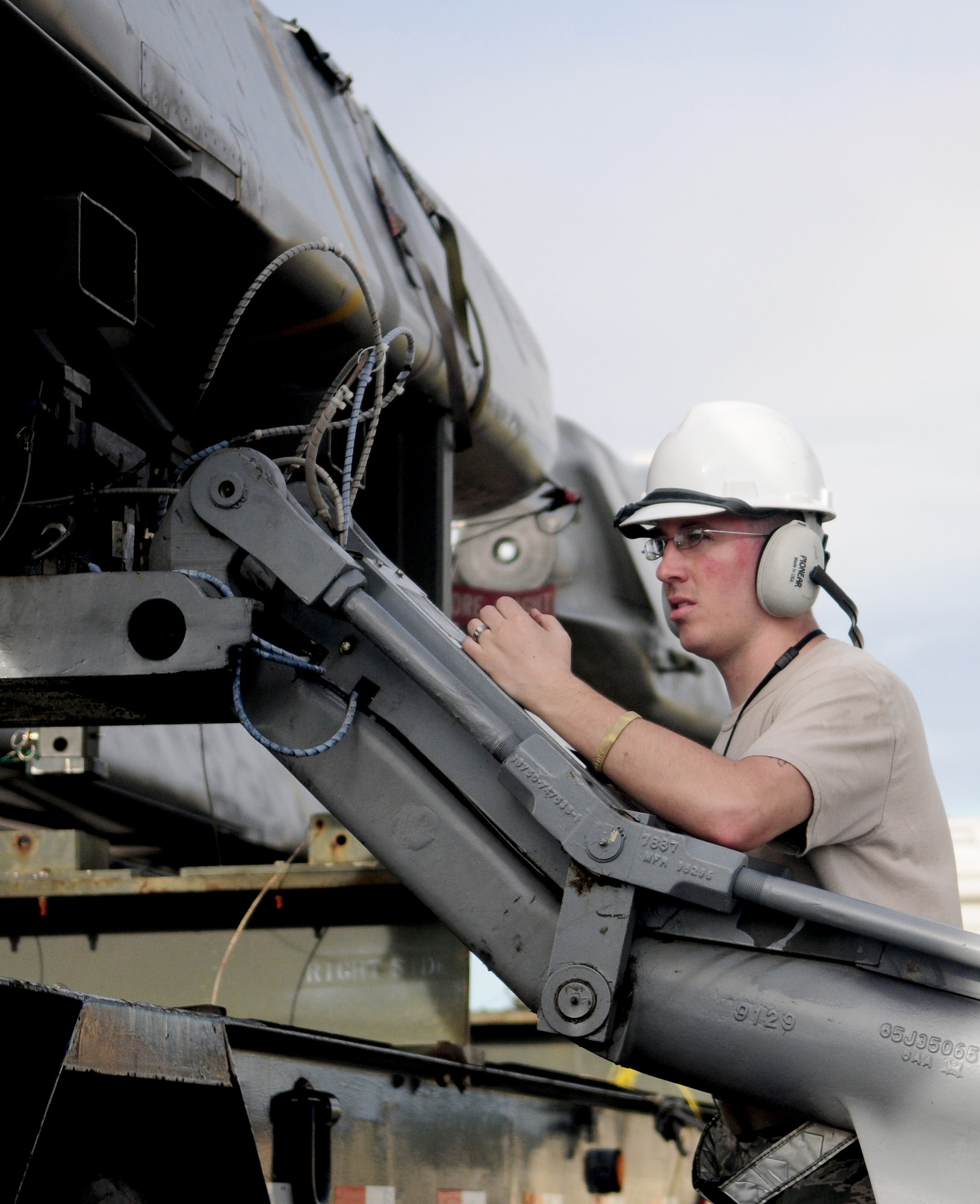 ANDERSEN AIR FORCE BASE, Guam- Staff Sgt. Zachary Neff, missile maintainer deployed from Barksdale Air Force Base, Loads a Conventional Air- Launched Cruise Missile during the Pre Combat Ammunition Production Exercise April 9. During the CAPEX approximately 100 inspectors will evaluate the processes and procedures for building munitions to support the wing’s operational plan.  (U.S. Air Force photo by Senior Airman Jeffrey Schultze)  