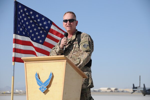KANDAHAR AIRFIELD, Afghanistan — Air Force Col. Benjamin Wham, U.S. Army Corps of Engineers Afghanistan Engineer District South commander, addresses the attendees at the strategic and tactical ramp turnover ceremony here, April 10, 2012.
