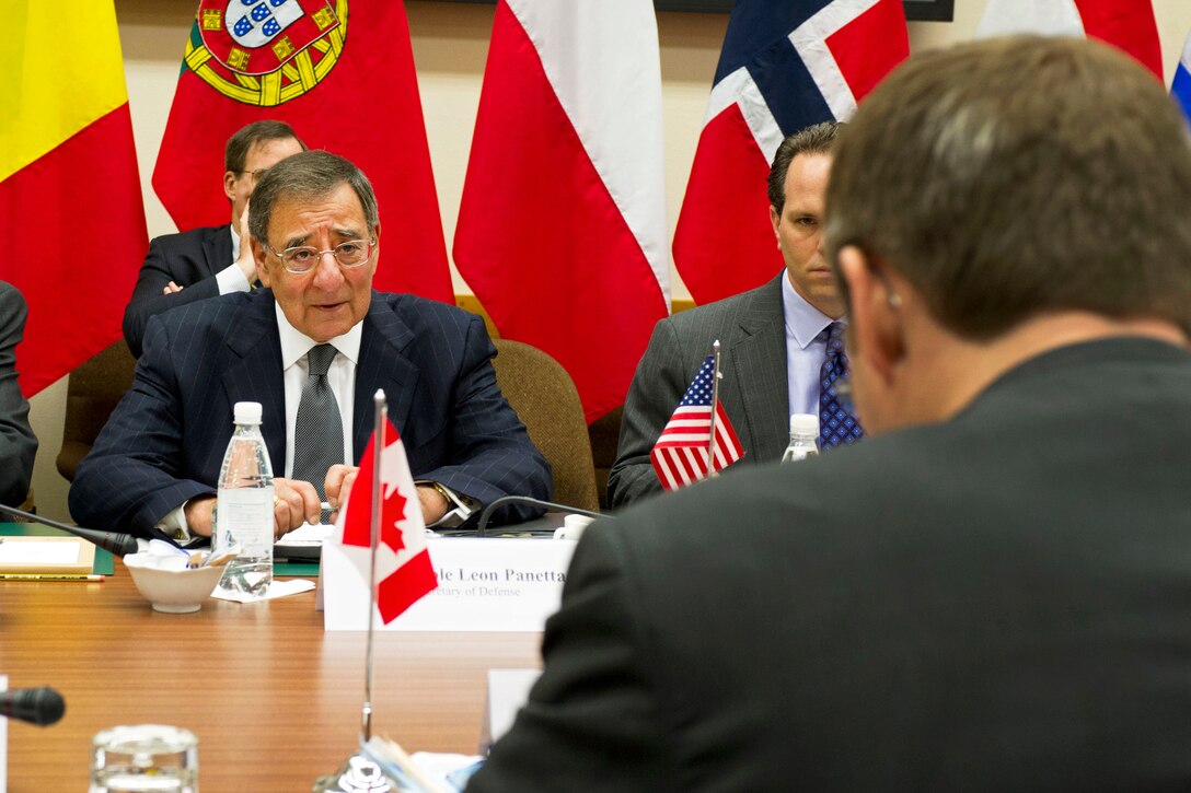 U.S. Defense Secretary Leon E. Panetta meets with Canadian Defense Minister Peter G. MacKay prior to the NATO "jumbo" ministerial conference at NATO headquarters in Brussels, April 18, 2012.