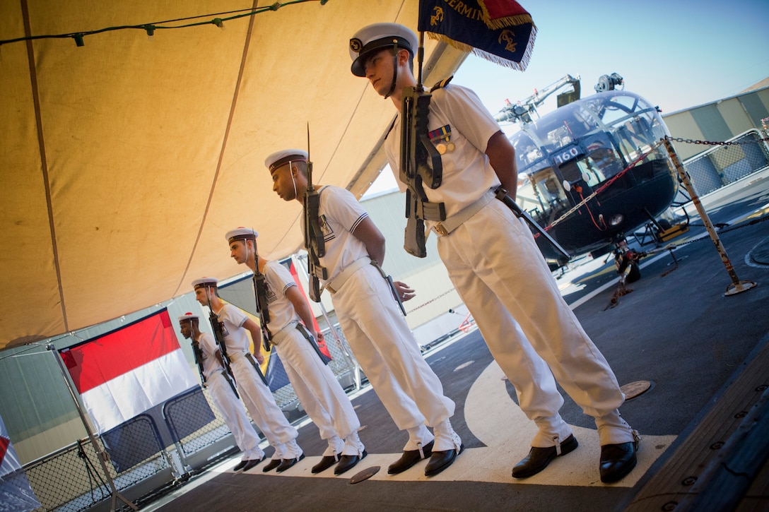 French sailors stand guard duty at the French navy reception aboard French frigate Germinal, April 18, 2012. The reception was held in honor of the War of 1812 Commemoration. New Orleans will serve as the inaugural city in a three-year national celebration commemorating the War of 1812 and the Star-Spangled Banner. The Marine Corps' role in this event reinforces its naval character, showcases the Navy-Marine Corps team and highlights the military's enduring relationship with the city of New Orleans. (U.S. Marine Corps photo by Lance Cpl. Marcin Platek/Released)