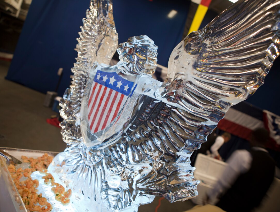 An ice statue in shape of an eagle decorates a shrimp buffet during a Navy reception aboard USS Wasp, April 18, 2012. The reception was held in honor of the War of 1812 Commemoration. New Orleans will serve as the inaugural city in a three-year national celebration commemorating the War of 1812 and the Star-Spangled Banner. The Marine Corps' role in this event reinforces its naval character, showcases the Navy-Marine Corps team and highlights the military's enduring relationship with the city of New Orleans. (U.S. Marine Corps photo by Lance Cpl. Marcin Platek/Released)