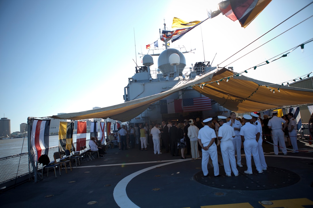 Guests stand outside on the aft of the French frigate Germinal during a French navy reception held in honor of the War of 1812 Commemoration, April 18, 2012.  New Orleans will serve as the inaugural city in a three-year national celebration commemorating the War of 1812 and the Star-Spangled Banner. The Marine Corps' role in this event reinforces its naval character, showcases the Navy-Marine Corps team and highlights the military's enduring relationship with the city of New Orleans. (U.S. Marine Corps photo by Lance Cpl. Marcin Platek/Released)