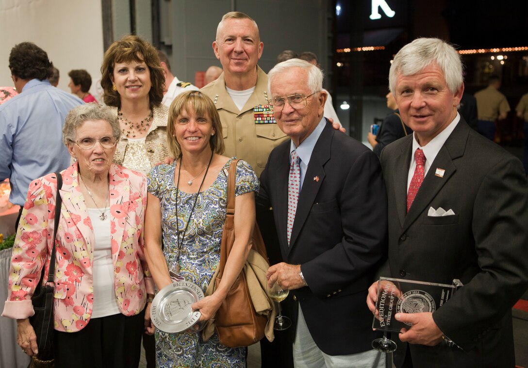 Lt. Gen. Steven A. Hummer, commander of Marine Forces Reserve and Marine Forces North, and his wife, Sheri Hummer, gather with Mark Romig, chief executive officer of the New Orleans Tourism Marketing, Mary Beth Romig, director of communications and public relations for the New Orleans Convention and Visitor Bureau, and her parents during a reception aboard USS Wasp in honor of the War of 1812 Commemoration, April 18, 2012. The reception was held in honor of the War of 1812 Commemoration. New Orleans will serve as the inaugural city in a three-year national celebration commemorating the War of 1812 and the Star-Spangled Banner. The Marine Corps' role in this event reinforces its naval character, showcases the Navy-Marine Corps team and highlights the military's enduring relationship with the city of New Orleans. (U.S. Marine Corps photo by Lance Cpl. Marcin Platek/Released)