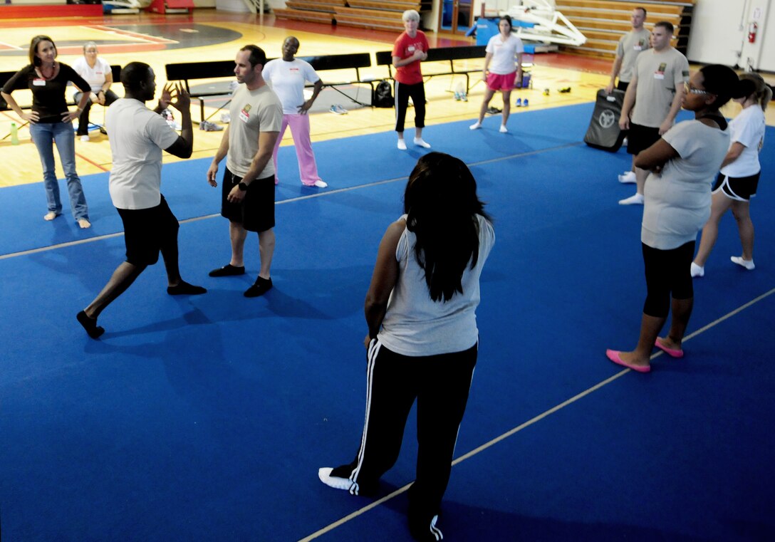 ANDERSEN AIR FORCE BASE, Guam- Airmen from the 736th Security Forces Squadron instruct members of Andersen’s Key Spouse club during a Sexual Assault Awareness Month self defense class April 17. The class is one of many activities happening during the monthlong awareness program. (U.S. Air Force photo by Senior Airman Jeffrey Schultze)  
