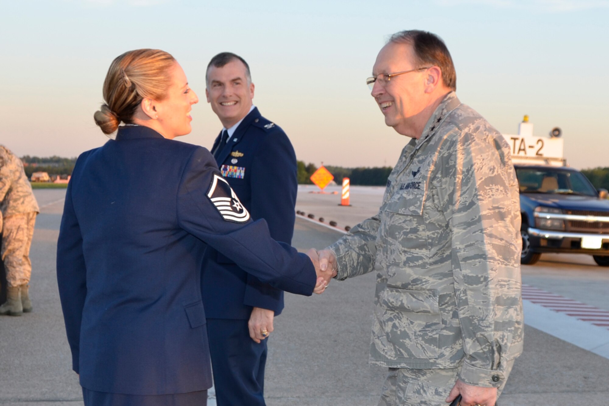 Master Sgt. Elena M. Lund, 94th Airlift Wing Law Office superintendent, greets Lt. Gen.  Charles E. Stenner, Jr., commander, Air Force Reserve Command, during his landing at Dobbins Air Reserve Base in route to the Annual Legal Conference in Atlanta, April 13. Lund escorted Stenner during his two day tenure. (U.S. Air Force photo/Master Sgt. James Branch)