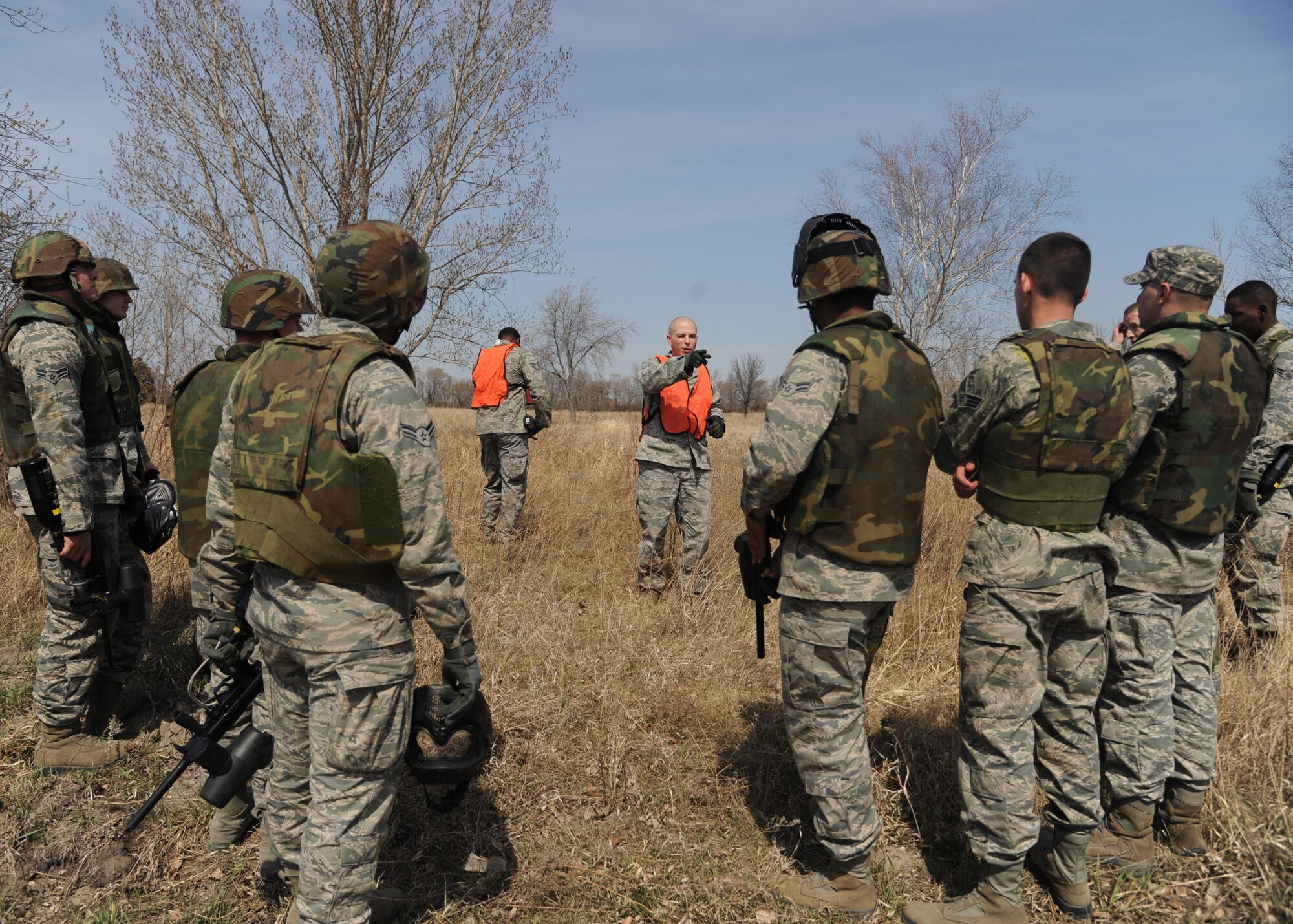 (Center) Staff Sgt. Matthew Kniffen, 319th Security Forces Squadron, leads augmentee training on April 13, 2012, on Grand Forks Air Force Base, N.D.  (U.S. Air Force photo by Senior Airman Amber Bennett)