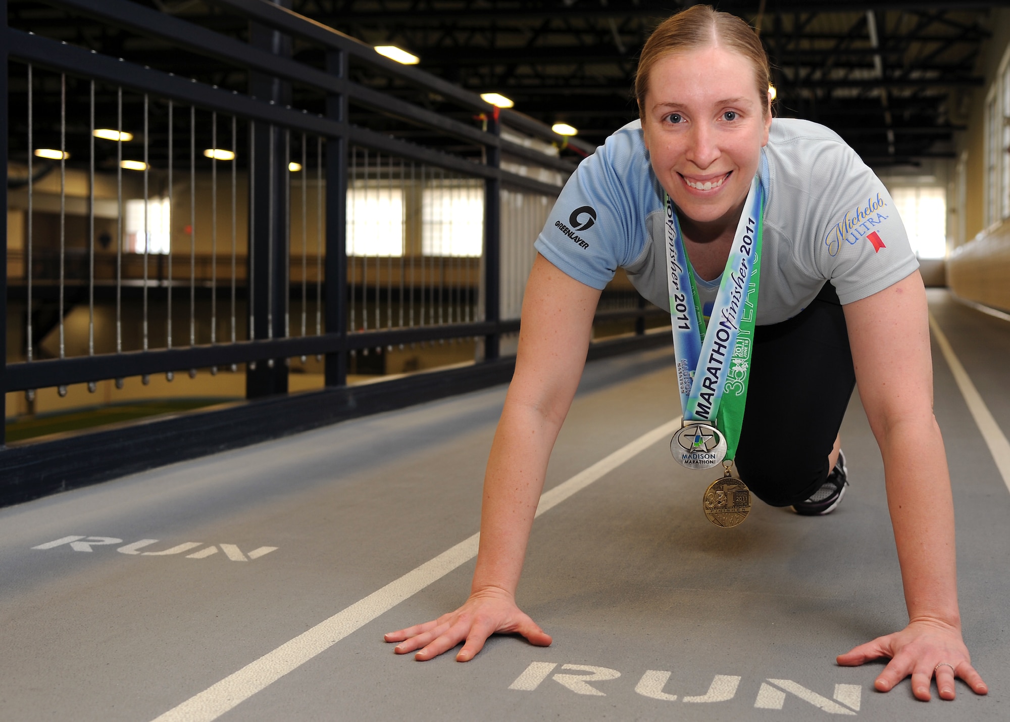 Tech. Sgt. Robyn Kaufhold, 319th Communications Squadron, poses for a photo at the Fitness Center on March 15, 2012, on Grand Forks Air Force Base, N.D.  Kaufhold was named as the base’s female Athlete of the Year award for 2011 by the base Fitness Center. (U.S. Air Force photo by Airman 1st Class Xavier Navarro)