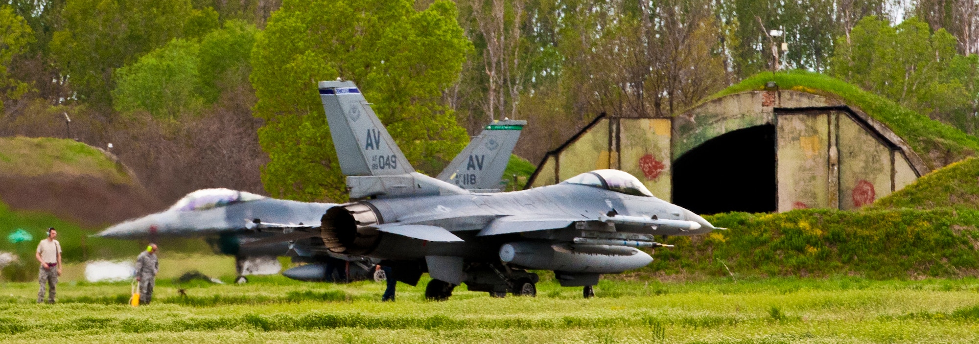 GRAF IGNATIEVO AIR FORCE BASE, Bulgaria -- Crew chiefs from the 31st Aircraft Maintenance Squadron perform post-flight maintenance on a 510th Fighter Squadron F-16 here April 17, 2012 after arriving from Aviano Air Base, Italy. More than two dozen aircraft and 500 U.S. Airmen from the 31st Fighter Wing at Aviano AB are taking part in Thracian Star 2012, a month-long joint training exercise focused on building partnerships and increasing interoperability with the Bulgarian air force. This is the third time since 2007 that men and women from the 31st FW have conducted this type of training with the Bulgarians. (U.S. Air Force photo/Senior Airman Katherine Windish)