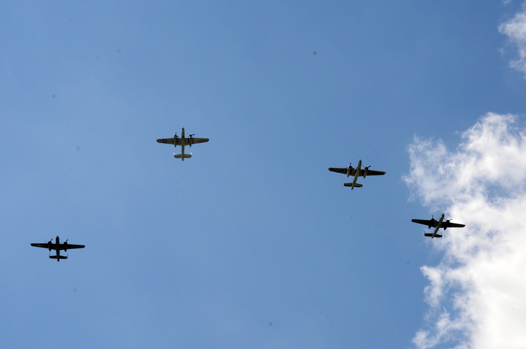 DAYTON, Ohio (04/2012) -- Twenty B-25 bombers took off from and flew over the National Museum of the U.S. Air Force on April 18, 2012, as part of the Doolittle Raiders 70th Anniversary Reunion. (U.S. Air Force photo by Jeff Fisher)