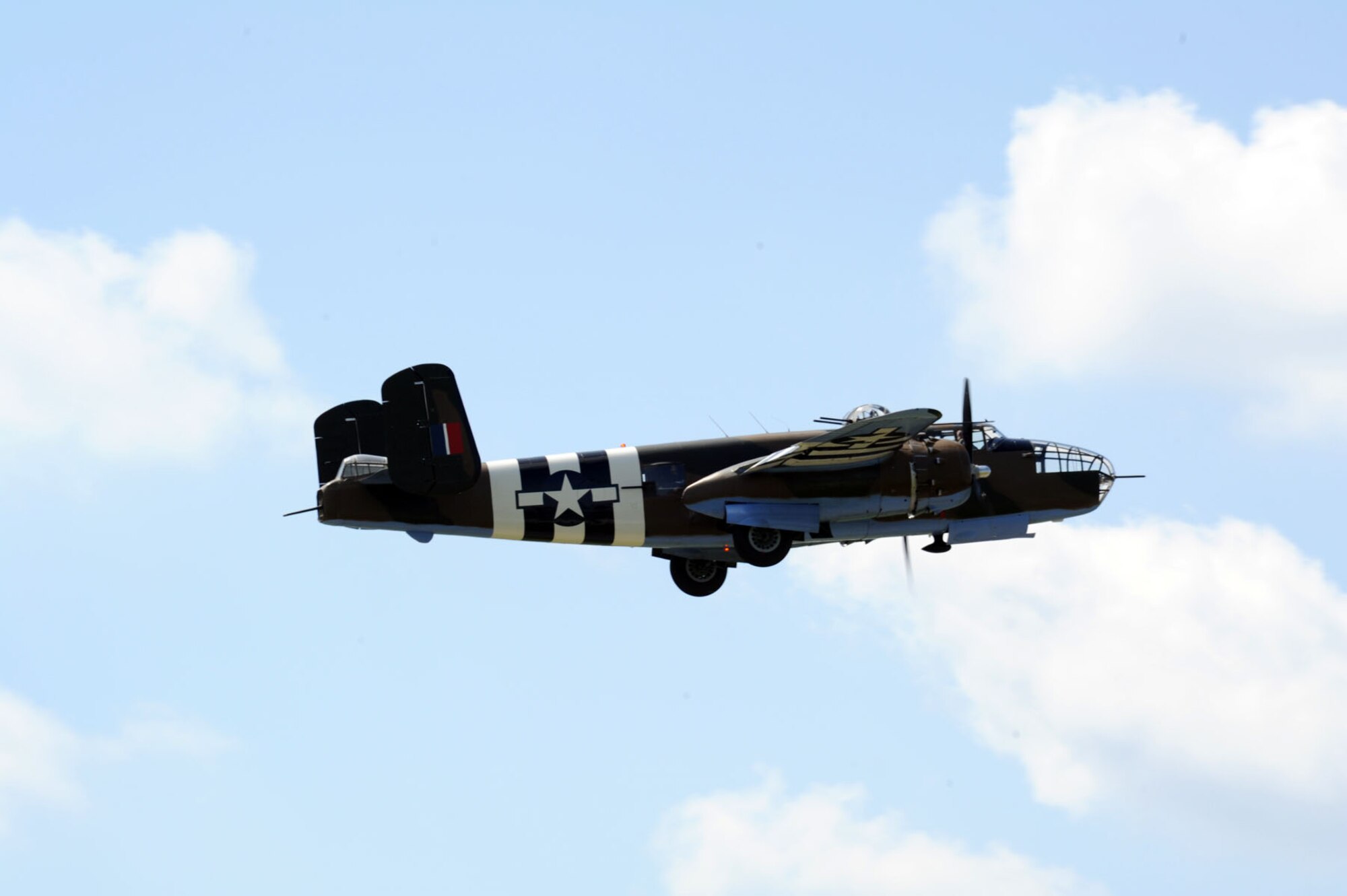 DAYTON, Ohio (04/2012) -- Twenty B-25 bombers took off from and flew over the National Museum of the U.S. Air Force on April 18, 2012, as part of the Doolittle Raiders 70th Anniversary Reunion. (U.S. Air Force photo by Jeff Fisher)