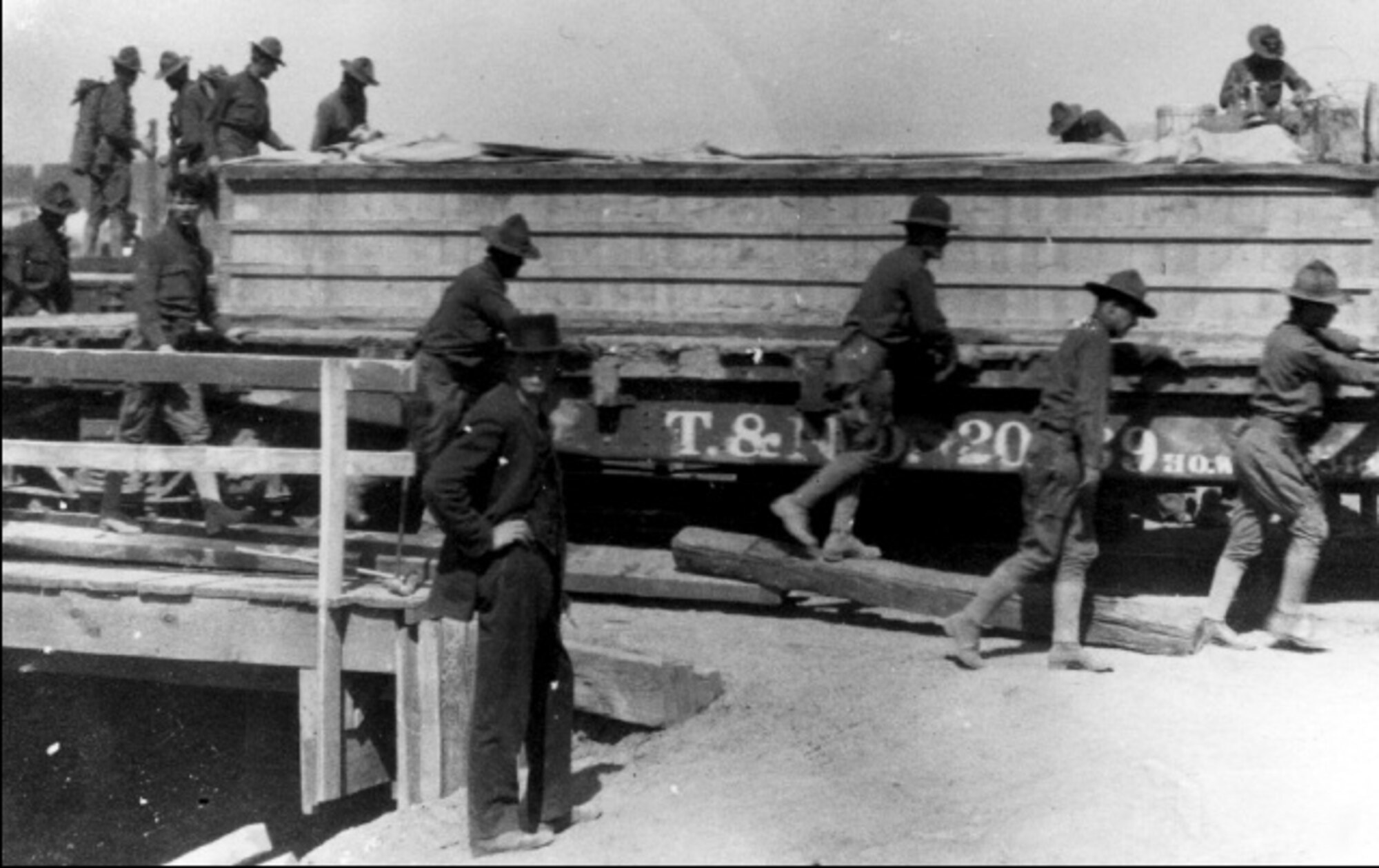 Members of the 1st Aero Squadron unload extra wings for the squadron’s aircrafts in Columbus N.M., March 1916. (Contributed photo)