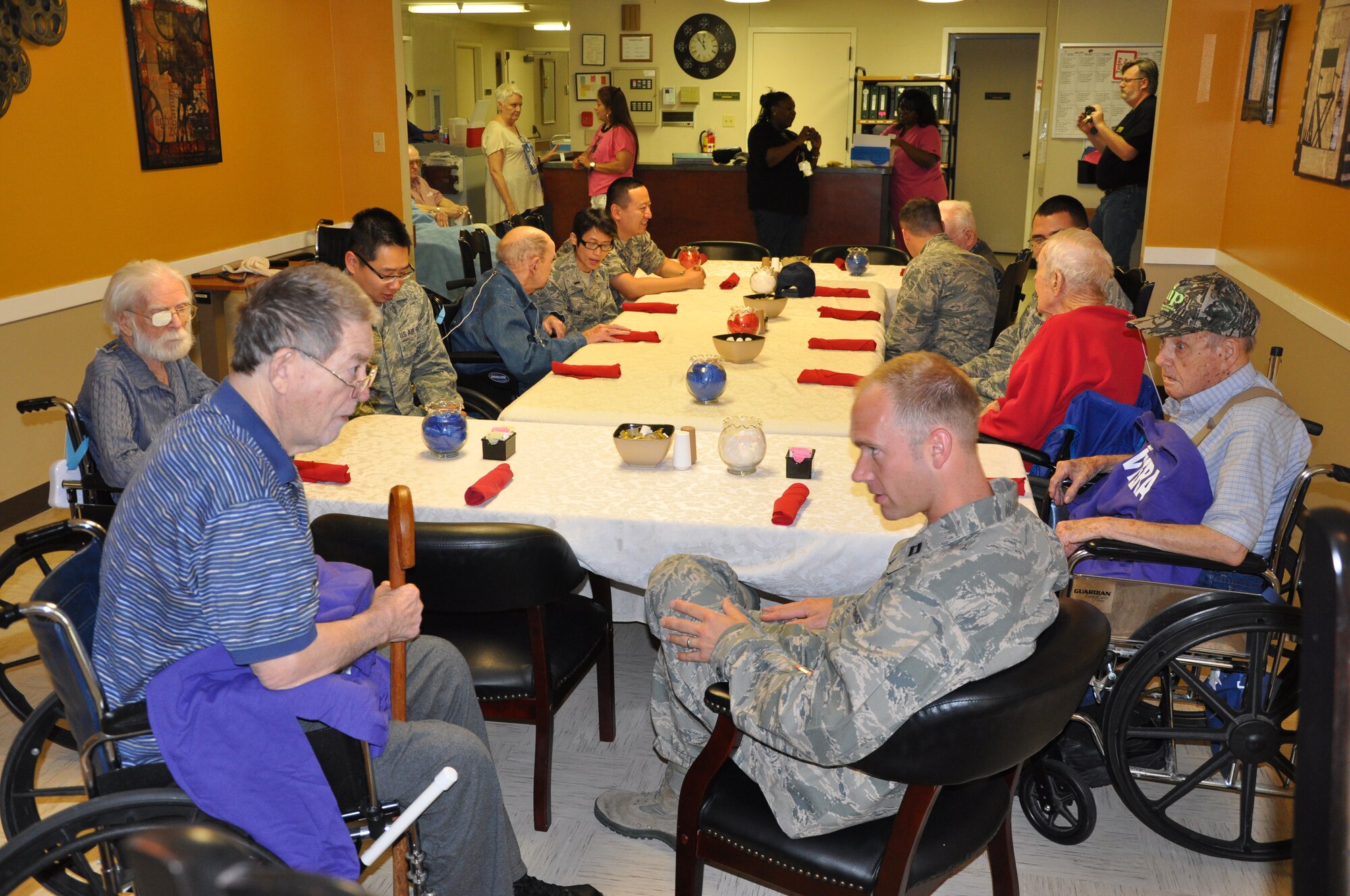 SAN ANGELO, Texas- Goodfellow's Company Grade Officer Counsel visits Meadow Creek Nursing Home, to have lunch with Army, Navy, Air Force and Marine Corps veterans. The veterans shared their past experiences with the officers. Among the veterans was a retired Air Force intelligence specialist from Goodfellow, and a pilot who still proudly wore his wings. (U.S. Air Force photo/2nd Lt. Leanne Caballer)   
